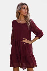 Robe à pois unis avec ourlet à volants
